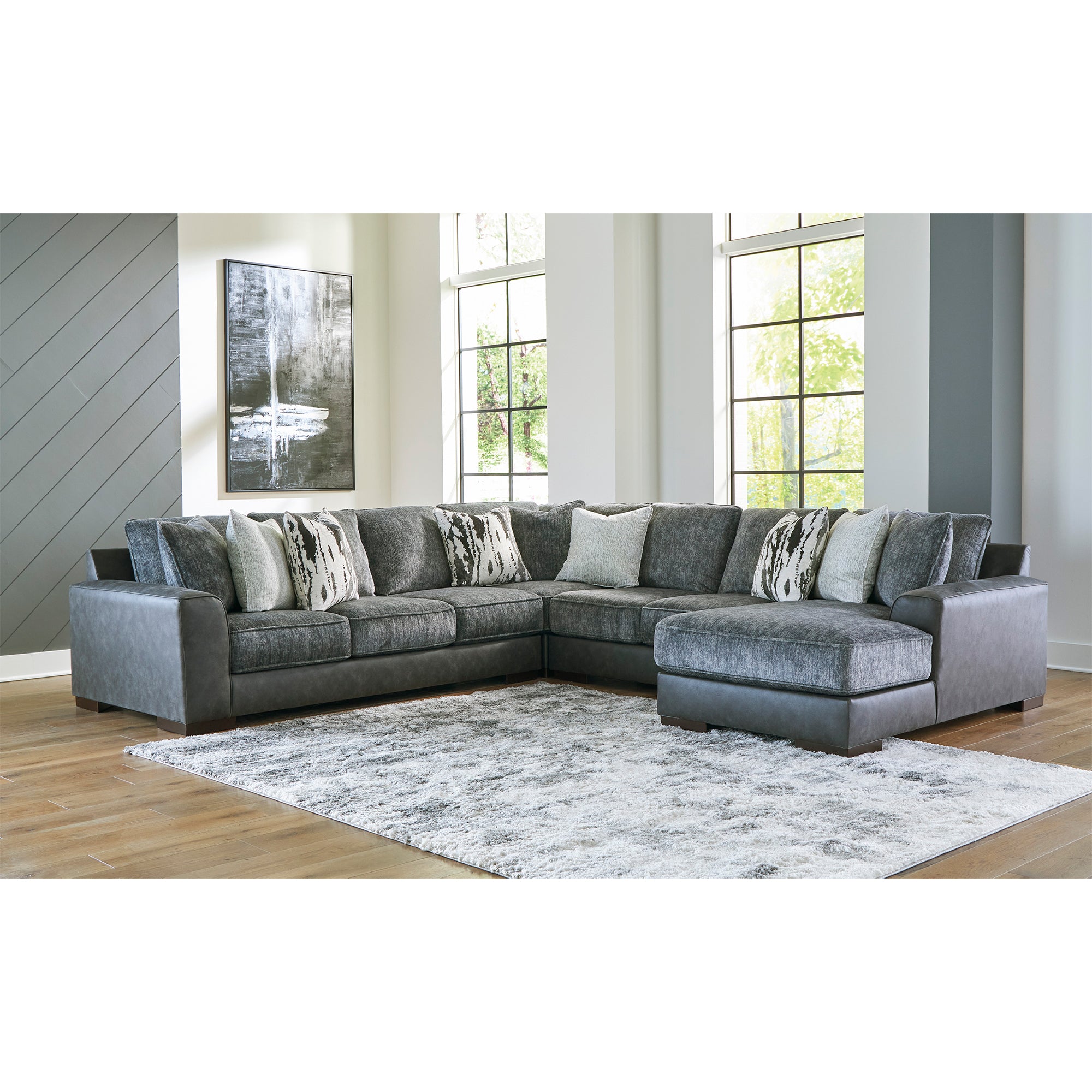 Larkstone 4-Piece Sectional with Chaise in Pewter Color