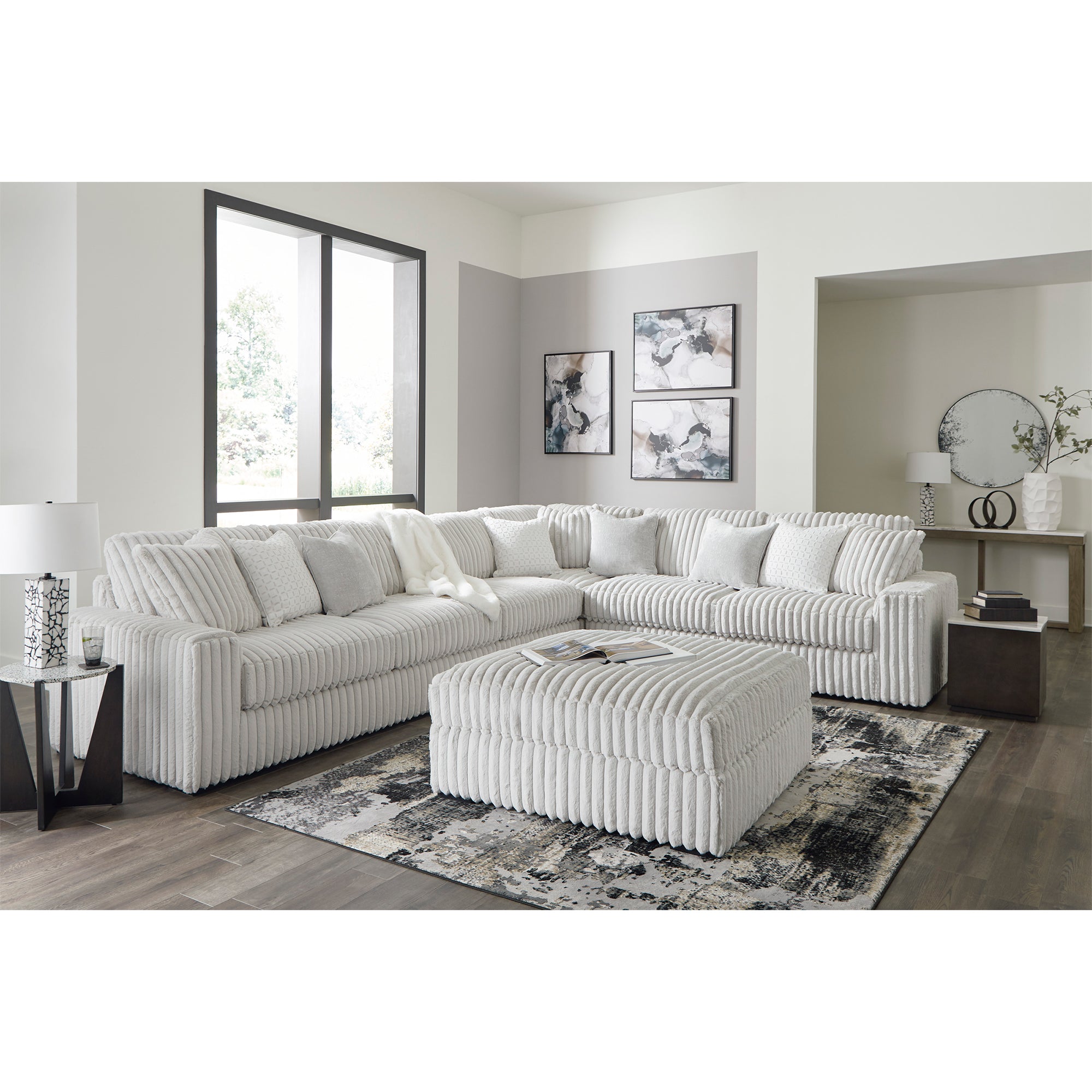Stupendous 4-Piece Sectional, a blend of everyday relaxation and distinctive design with its soft feather-fiber cushions