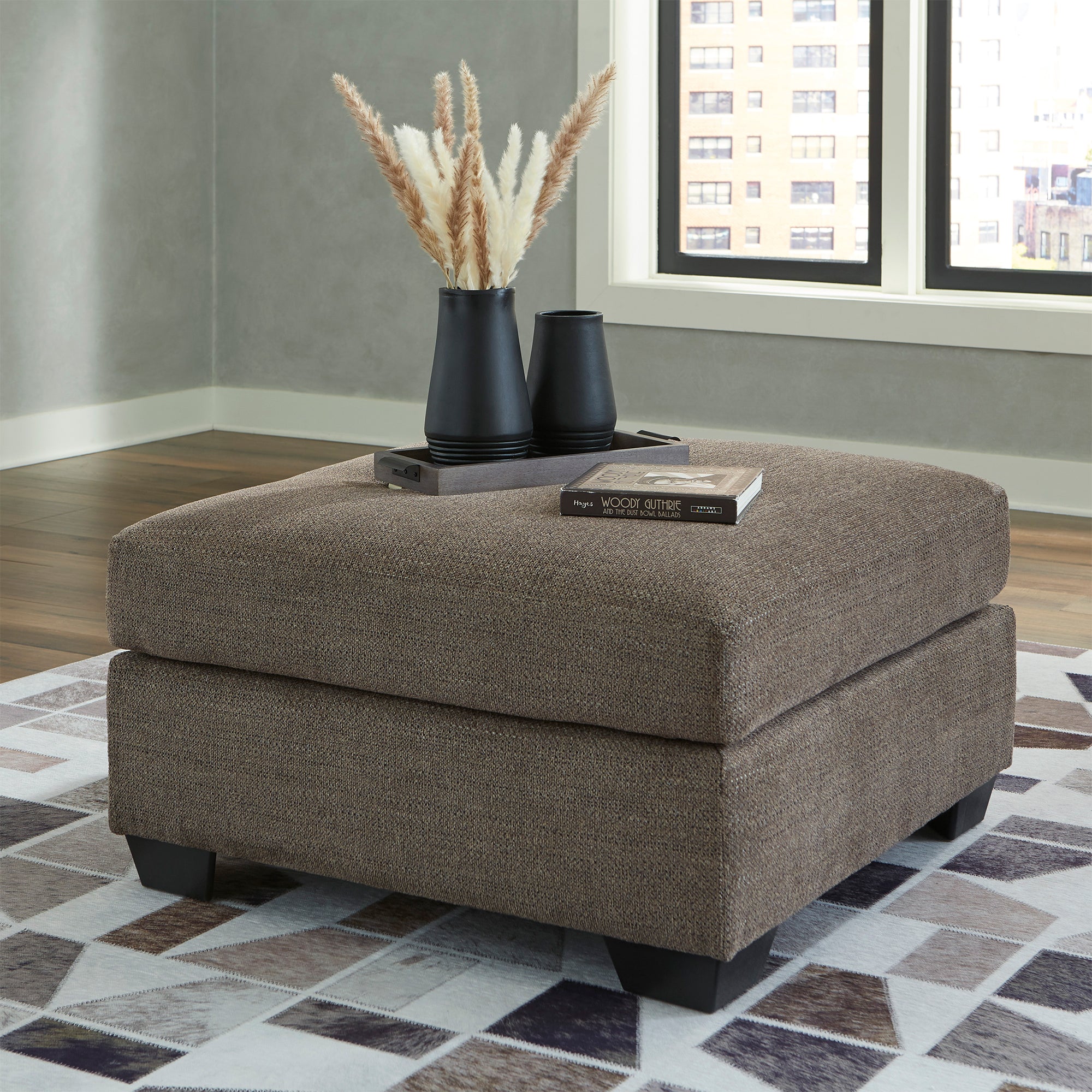 Elegant chocolate-colored Mahoney Oversized Accent Ottoman, ideal for extra seating or as a plush footrest