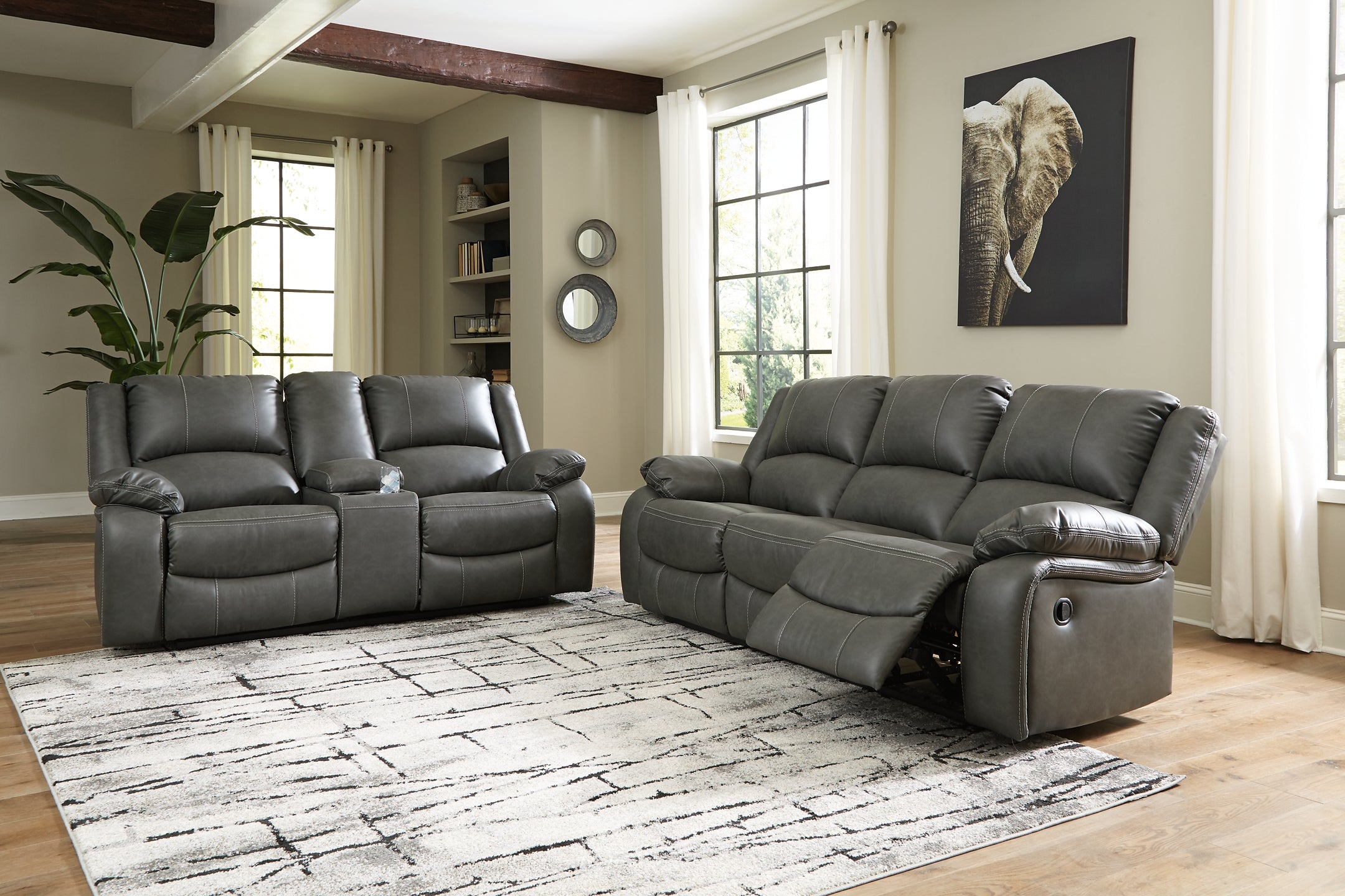 Calderwell Manual Reclining Sofa and Loveseat